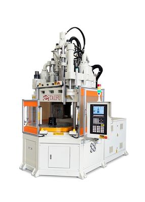 Máquina de moldagem por injecção de mesa rotativa vertical