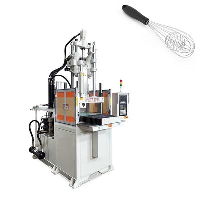 Máquina de moldagem por injecção vertical