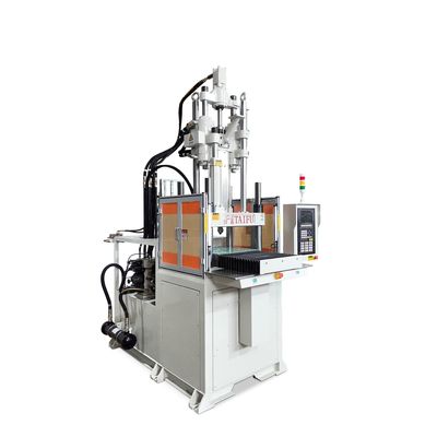 Máquina de moldagem por injecção vertical