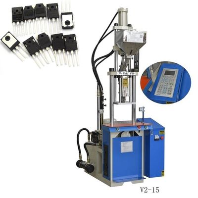 Máquina de moldagem por injecção vertical para fabricação de componentes de circuitos