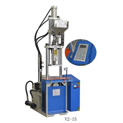 Máquina de moldagem por injecção vertical para fabricação de componentes de circuitos